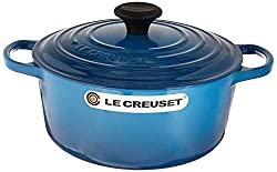 a blue Le Creuset cast iron Dutch oven