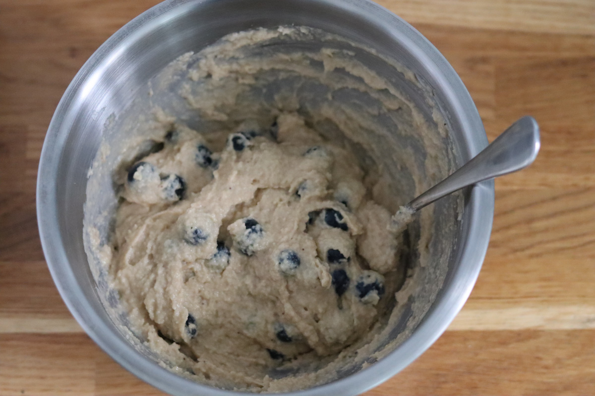 banana and blueberry muffins batter in a large bowl