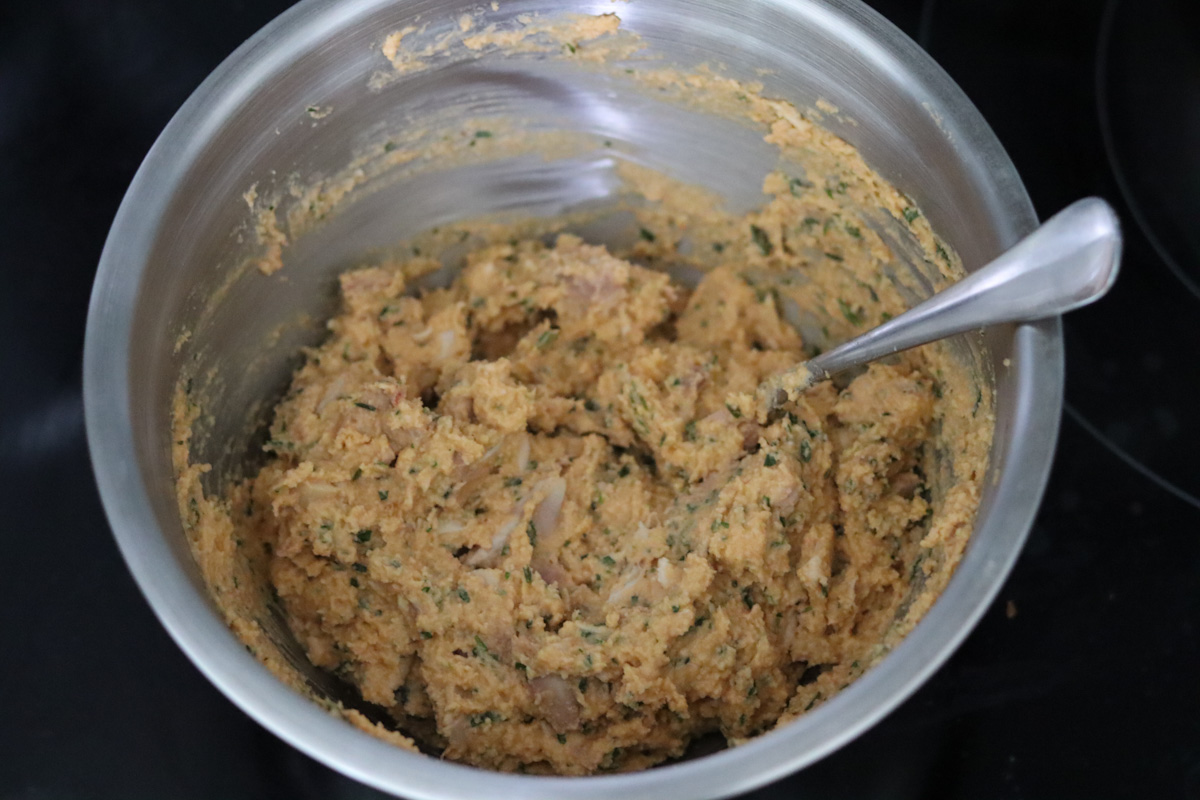 chicken muffin batter in a mixing bowl