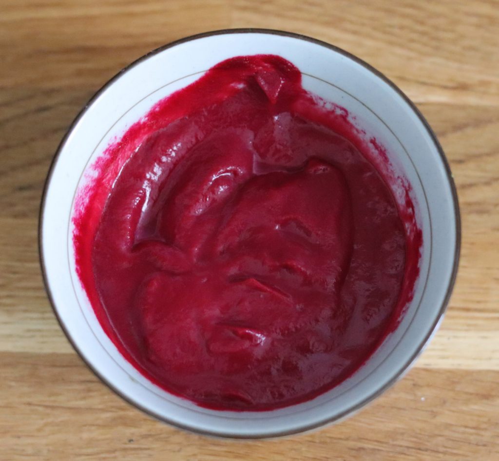 No dye pink frosting in a bowl