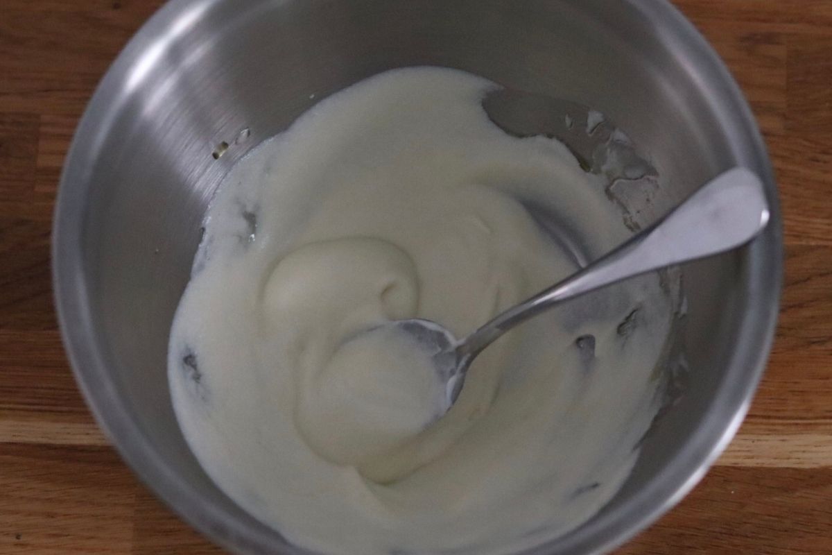 all the wet ingredients for the biscuits mixed in a large bowl