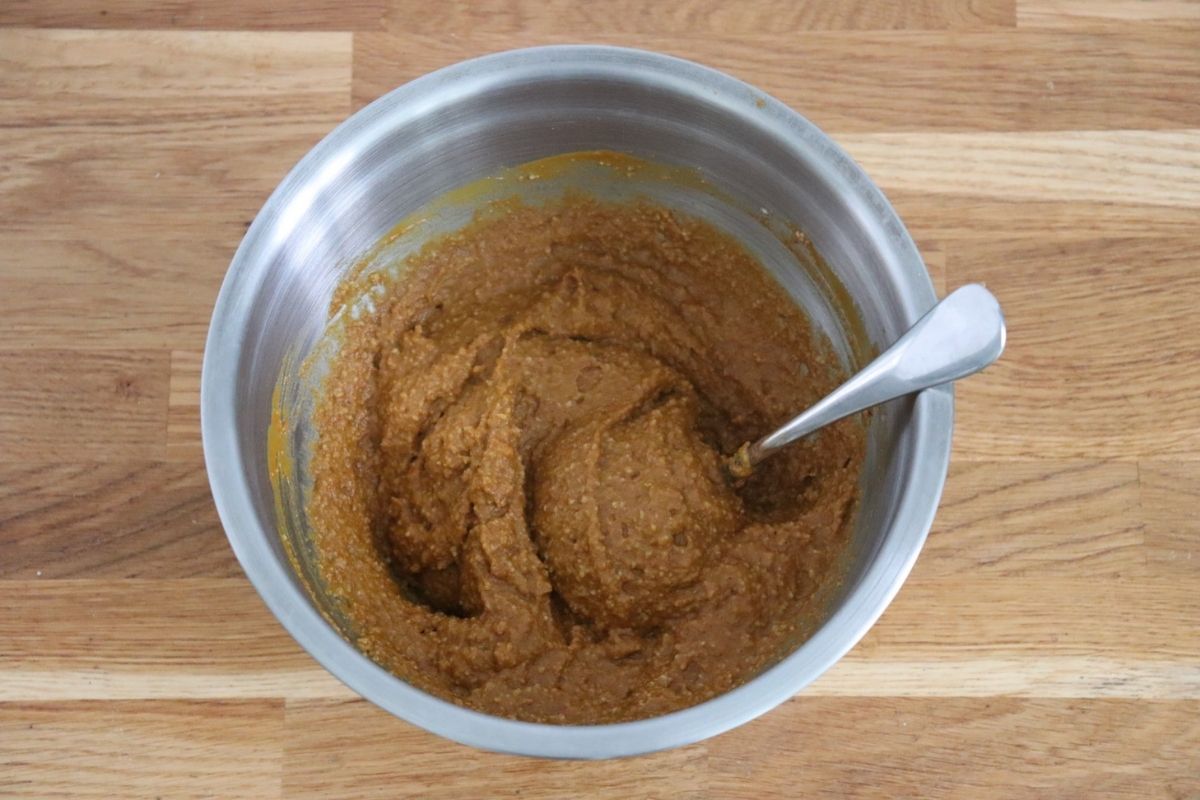 All the ingredients for the gingerbread loaf mixed together in a bowl to make the batter