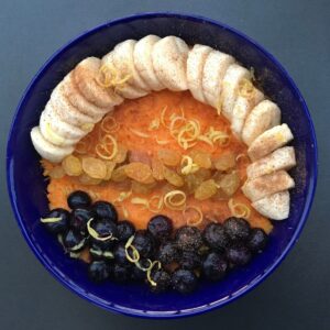 sweet potato purée with golden raisins, blueberries and a sliced banana spinkled with lemon zest and cinnamon