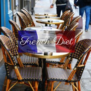 A French restaurant terrace with table and chairs aligned and "French diet" written over it.