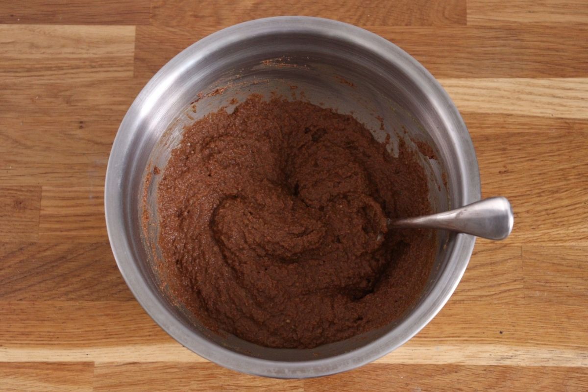 All the liquid and dry ingredients for the chocolate raspberry cake mixed together to form a batter.