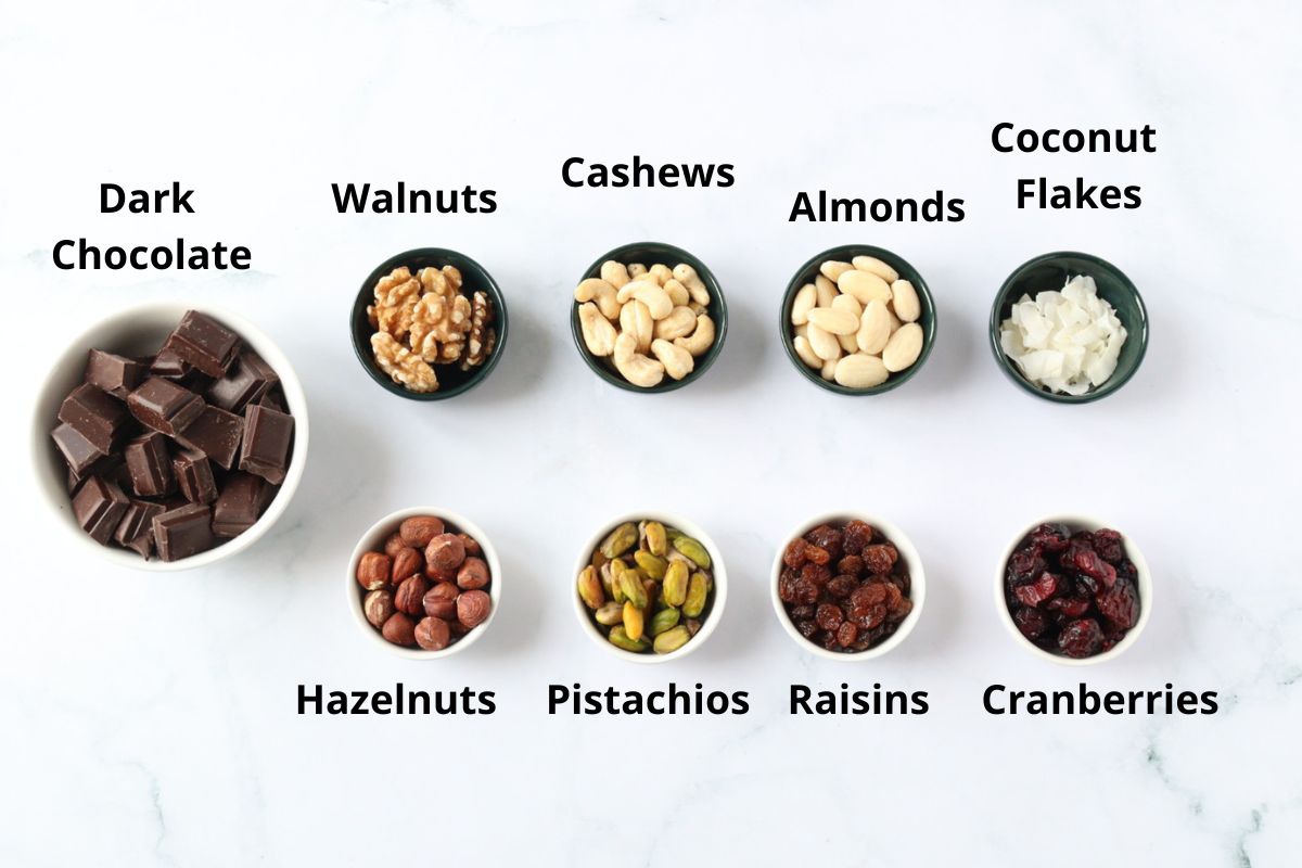 All the ingredients for French Chocolate Bark spread on a kitchen counter.