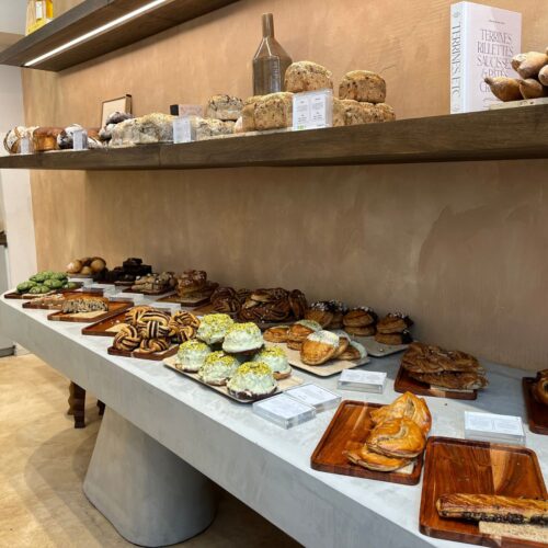 Inside of a dedicated gluten free bakery in Paris: all kinds of gluten free breads and pastries.